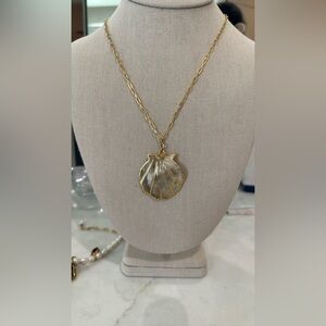 Gold and shell necklace.